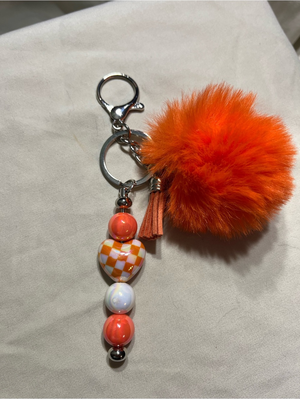 Vibrant Orange Pom Pom Keychain with Beaded Heart Charm